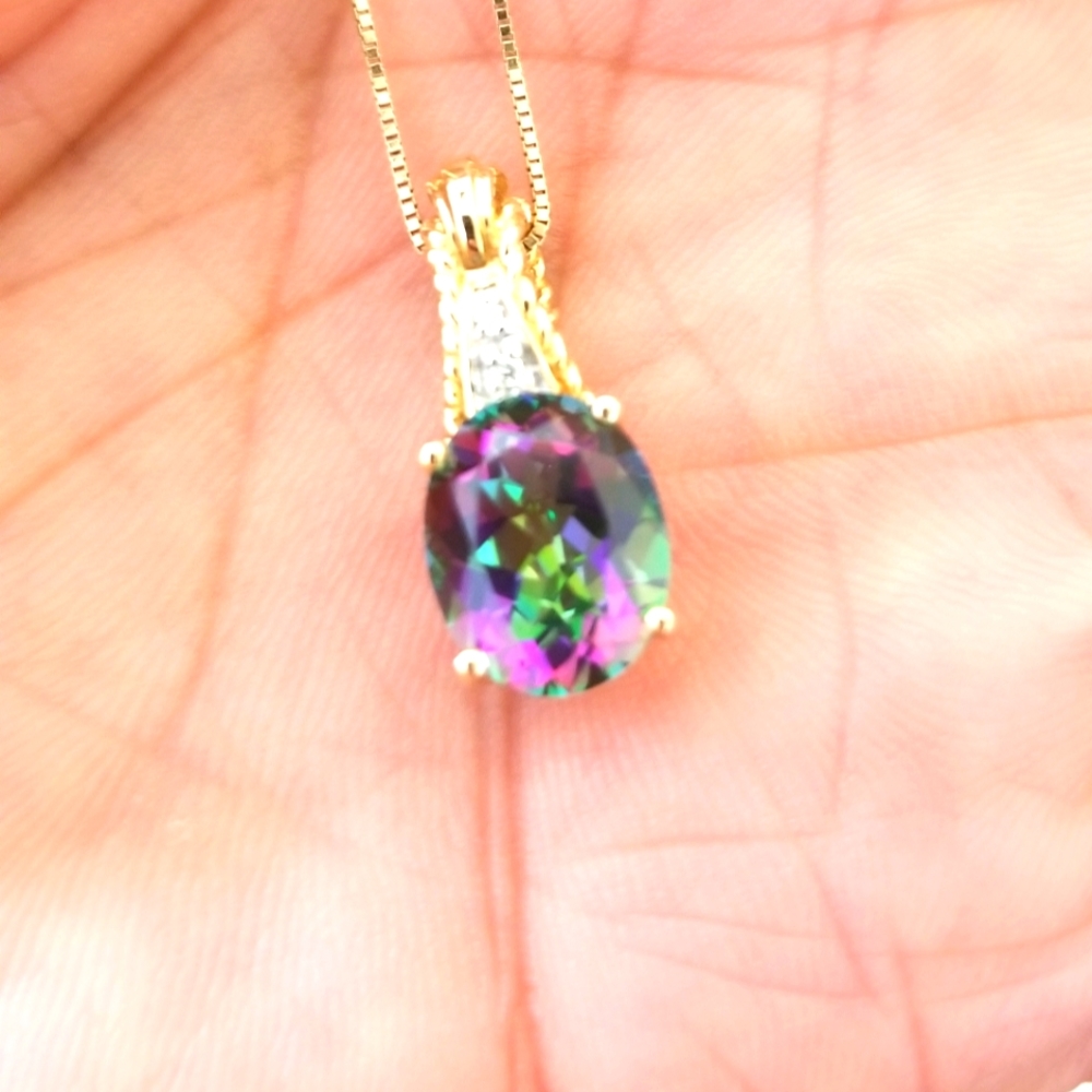 14k solid yellow gold with natural diamonds and 4ct topaz pendant